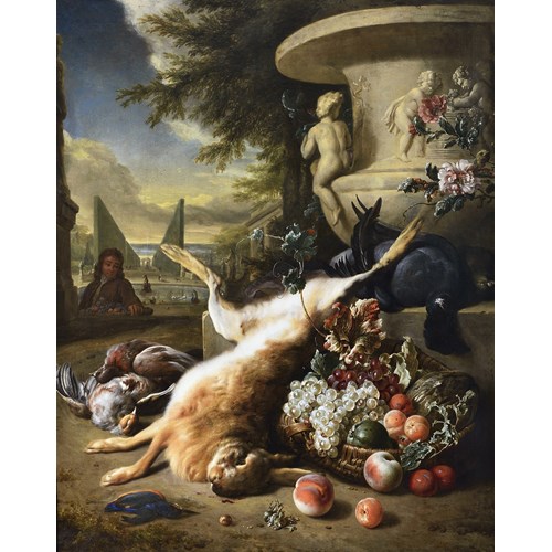 A grouse, kingfisher, and other game birds with a hare and a basket of fruit at the foot of a carved stone urn, an Italianate garden with a fountain beyond